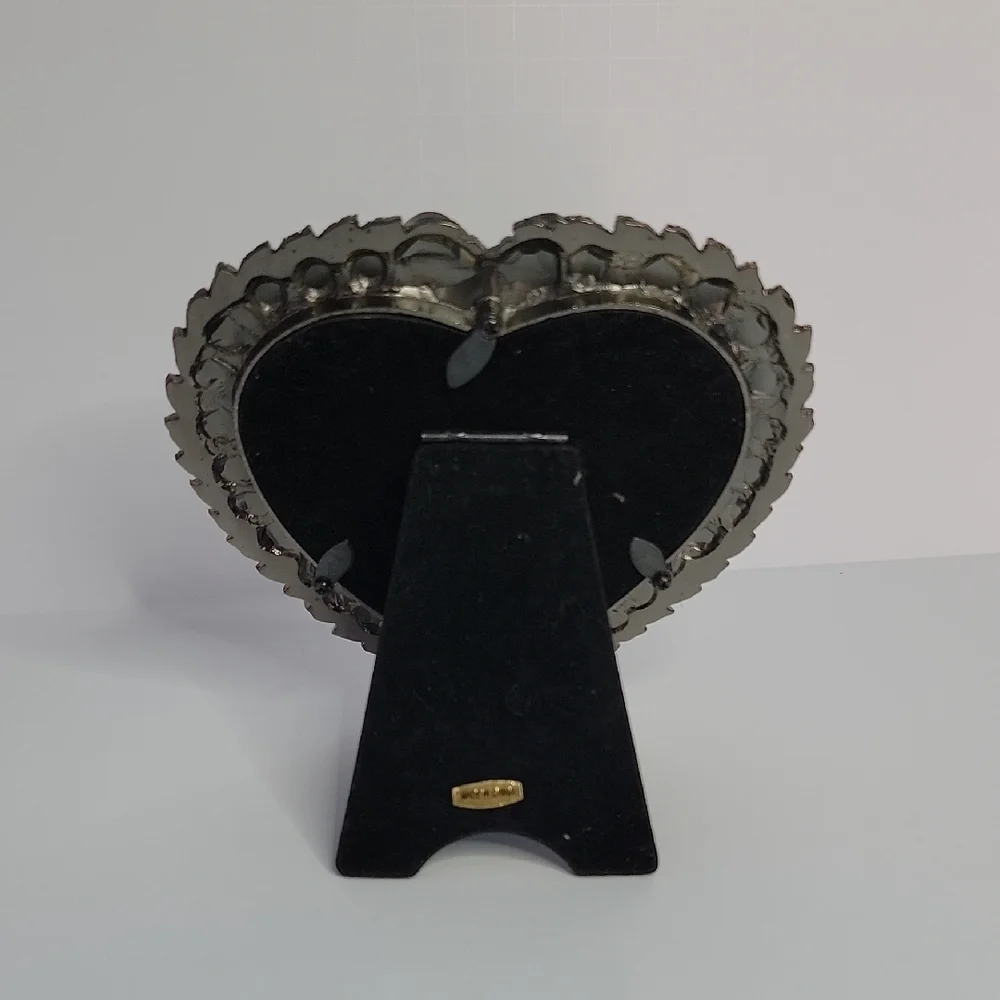 Heart-Shaped Bronze Frame with Red Accents